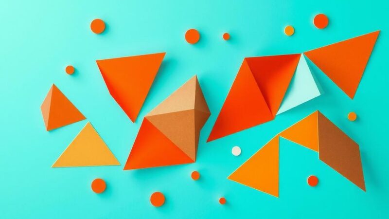 Gambaran abstrak yang menampilkan tren kesehatan dengan latar belakang warna cerah dan pola geometris.